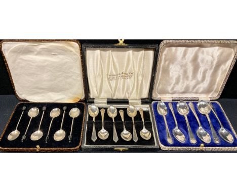 A set of six silver golfing spoons, Sheffield 1933;  set of six tea spoons, Sheffield 1961, others coffee bean spoons, all ca