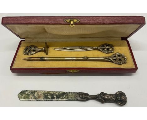 A late Victorian silver Cherub handled moss agate letter knife (blade af), London 1899;  cased dipping pen, letter clip and s