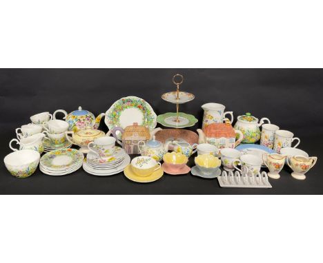 A Franklin &amp; Cook tea service for six, printed and painted with spring flowers, comprising teapot, cream jug, sugar bowl,