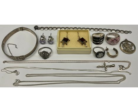 Selection of Silver Jewellery to include; a half hinged patterned bangle, a bracelet, a St. Christopher pendant, four rings, 