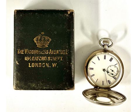 A Victorian silver half hunter pocket watch, white enamel dial, bold Roman numerals, minute track, subsidiary seconds, stem w