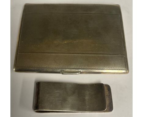 A George V silver rectangular cigarette case, 8cm long, London 1932; an Elizabeth II silver money clip, Sheffield 2001; 84.5g