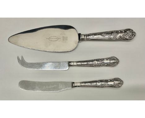A George VI silver hafted cake slice, Kings pattern, 25cm long overall, Sheffield 1938; an associated silver hafted butter an