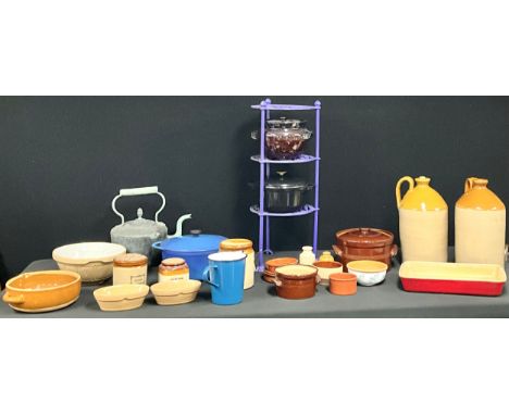 Kitchenalia - iron three tier pan stand,  cast iron casserole/oven dishes,  others stoneware, jars, bowls, flagons, mixing bo