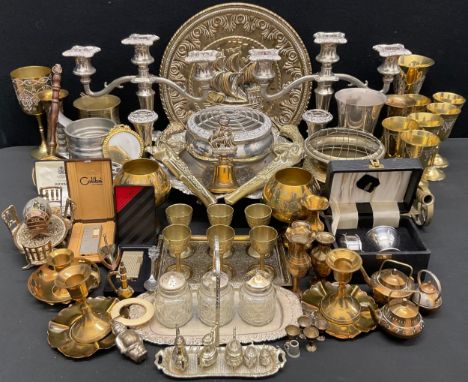 Metalware - a pair of silver plated two branch candelabra, brass six serving drinking set on tray, Ronson, Colibri  and other