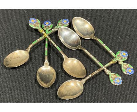 A set of six Art Deco silver and enamel coffee spoons, each stem decorated with a flower, Walker &amp; Hall, Birmingham 1937,