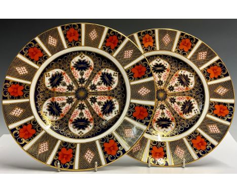 A pair of Royal Crown Derby Imari 1128 pattern dinner plates, 27cm diameter, printed marks in red, first quality