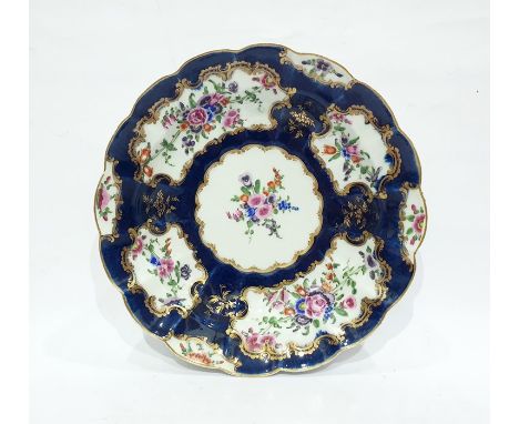                                     18th century Worcester porcelain dish, circular and scalloped, the blue scale ground bear