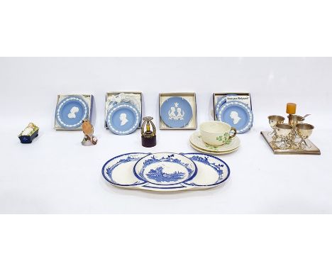 Royal Worcester model of a chaffinch, a Belleek cup and saucer of basket weave design and with clover decoration and similar 