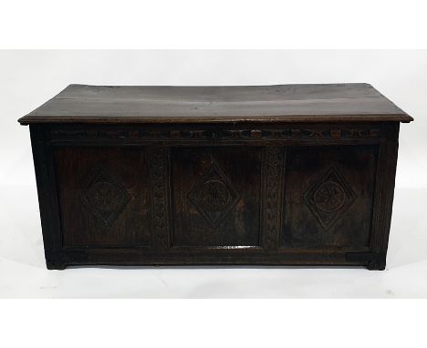 18th century oak coffer with three diamond carved panels to the front, on cut-down stile supports, 130cm x 58cm