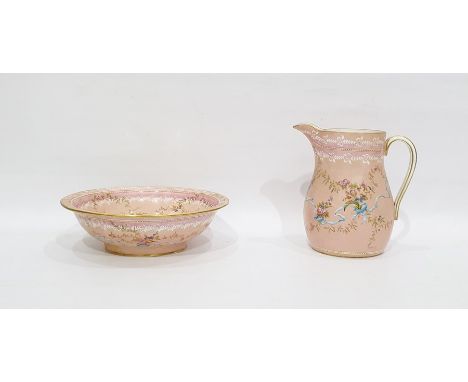 Edwardian Copeland's china ewer and basin decorated with roses and ribbons, on a pink ground, with gilt borders and retained 