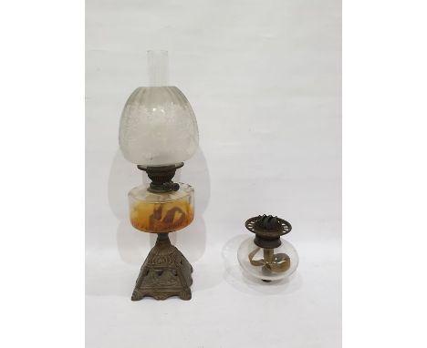 Victorian iron and glass oil lamp, the base pierced and decorated with sailing boats and another glass oil lamp well with met