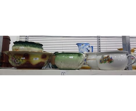 Four early 20th century chamber pots, a large basin and pot