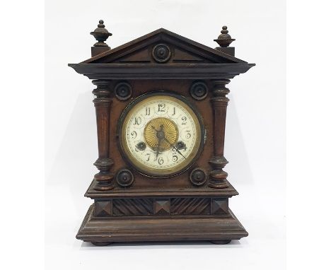 Early 20th century mantel clock with ivorine dial, in architectural walnut case, 30cm high 
