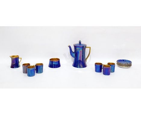 Carltonware coffee set decorated in blue lustre, with gilt interiors, comprising coffee pot, milk jug, sugar bowl and six cof