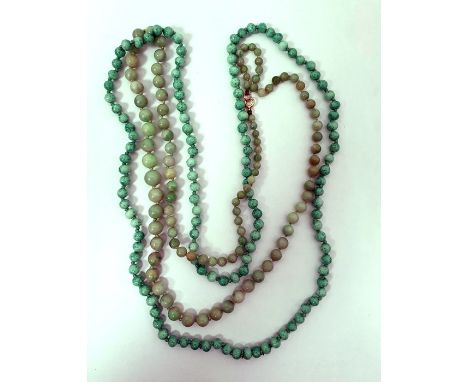 Graduated jade bead necklace and a green glass bead necklace (2) 