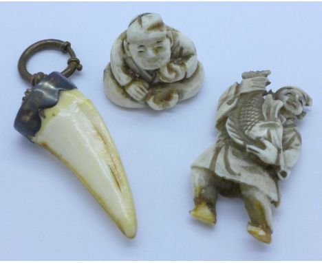 A carved netsuke, one other carved figure a/f and a mounted tooth
