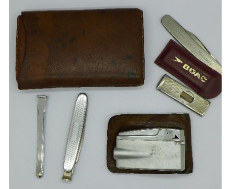 A silver BOAC cigar cutter, a cigar case, an advertising pocket knife, Singer Sewing Machines, etc.