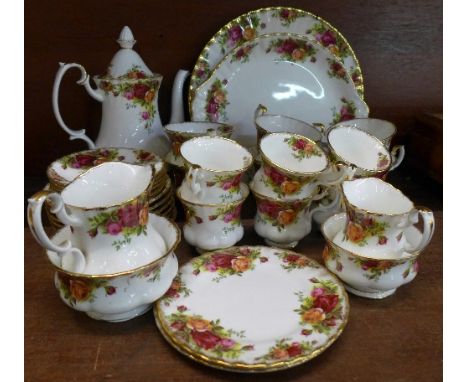 A Royal Albert Old Country Roses coffee service, six tea cups and saucers, a cream and sugar, etc., (33)