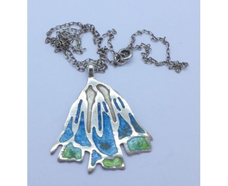 A white metal and enamel pendant, hallmark worn