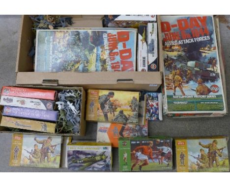 A collection model soldiers, mainly Airfix and two Timpo, Airfix footballers and model kits