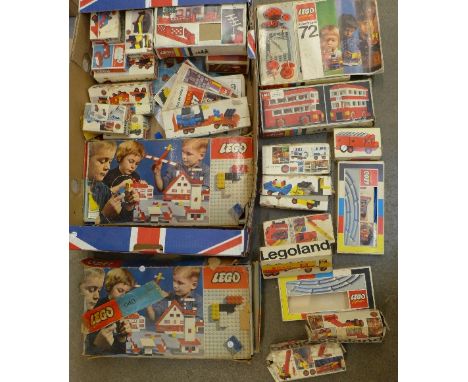 A collection of twenty-four Lego sets, including vehicle and scenery kits, London bus, Lego System engine, etc.