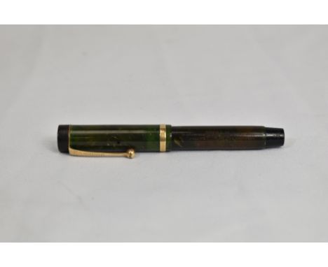 A Parker Duofold Jr Lucky Curve button fill fountain pen in Jade green with single band to Flat top cap having Parker nib. In