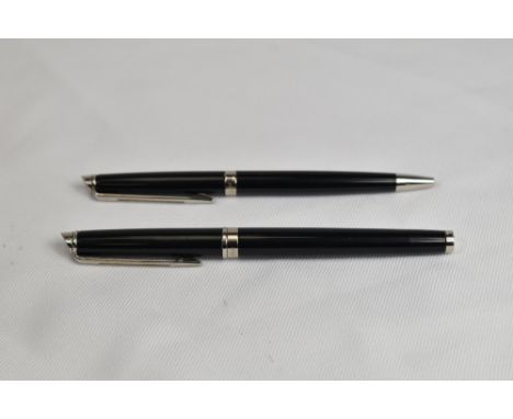 A Waterman Hemisphere Converter fill fountain pen and ballpoint pen set in black having Waterman nib. In Very Good condition