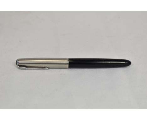 A Parker 51 button fountain pen in black with lustraloy cap. In good condition