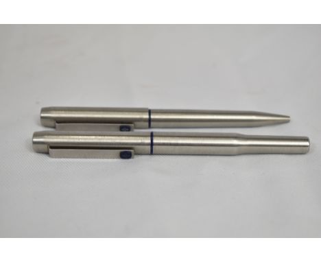 A Parker 25 Flighter converter fountain pen and ballpoint pen set in brushed steel. In good condition