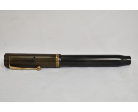 A Parker Duofold Senior button fill in black with single band to the cap having Parker Duofold nib. In good condition (slight