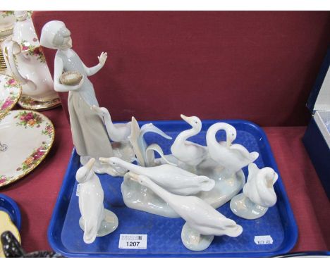 Lladro figurines to include group of three ducks, girl with duck three others. 1 tray (5)