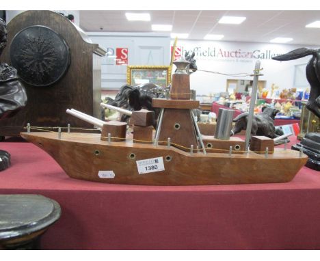 An Early XX Century Scratch Built Model of a WWI Battleship with three moving gun stations and metal fittings, 45cm long.