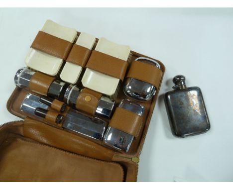 A LATE 1950'S ASPREY TAN LEATHER BRIEFCASE,  also a Finnigans Manchester tan leather cased Gentleman's travelling toilet comp