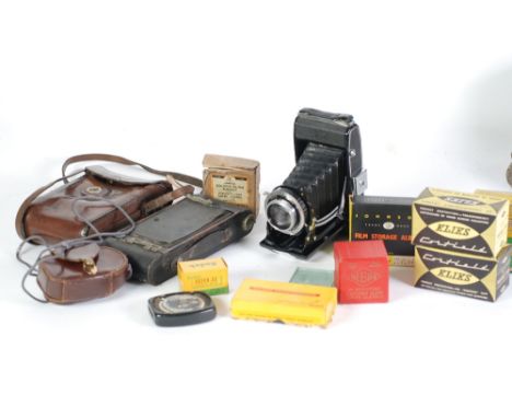 ZEISS IKON 'IKONTA 521/3' BELLOWS FOLDING ROLL FILM CAMERA in an Art Deco design bright metal and black body with Novar Anast