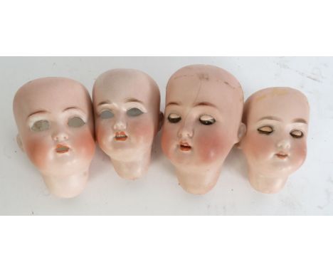 APPROX 35 BISQUE DOLL HEADS, including; SHOENALL HOFFMEISTER 1909 2, 2 1/2" diameter; ALT, BECK & GOTTSCHALCK 1362 2, 3" diam