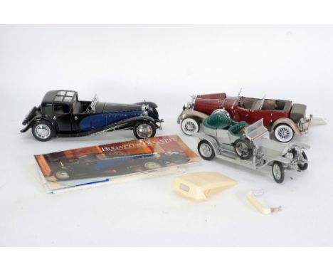 THREE FRANKLIN MINT SCALE MODEL AUTOMOBILES with paperwork