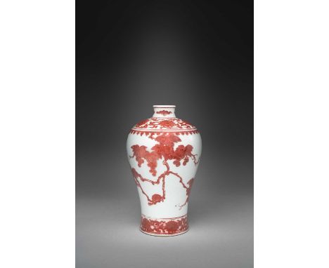 A RARE CHINESE UNDERGLAZE COPPER RED 'SQUIRREL AND VINE' MEIPING KANGXI 1662-1722  The finely potted vase decorated around th