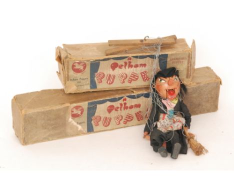 An early Pelham puppet of a skeleton and another of a witch, both boxed (2)