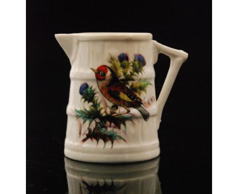 A late 19th Century Royal Worcester jug formed as a cooper barrel decorated with a hand painted Goldfinch, green mark with da