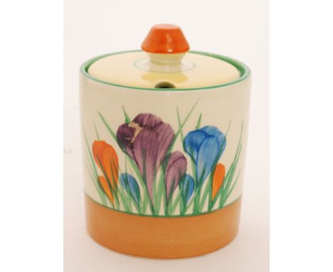 A Clarice Cliff Crocus pattern cylindrical drum preserve pot circa 1950 hand painted with crocus sprays with orange, yellow, 