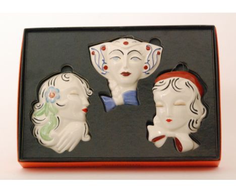 A boxed set of three Wedgwood re-issue Clarice Cliff face masks comprising Sadie, Dutch Girl and Ivy, numbered 100 from a lim