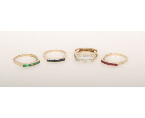 A modern 14ct two row diamond ring with three separate interchangeable shanks each set with seven square cut stones comprisin