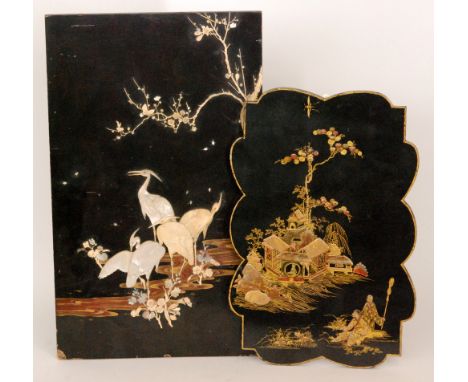 A 19th Century Japanese shibyama lacquered panel decorated with storks below a fruiting bough and signed with a mother of pea