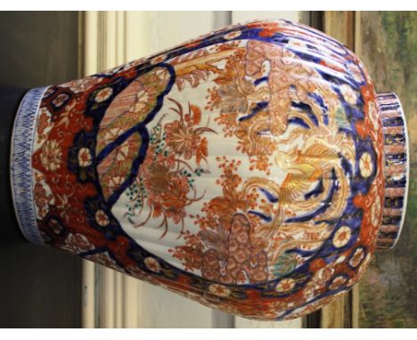 A 19th century Japanese Imari baluster style vase with blue and ochre floral and foliate depictions, 40cm high £70-100