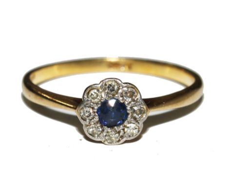 A sapphire and diamond posy ring set in 18 carat gold £60-80