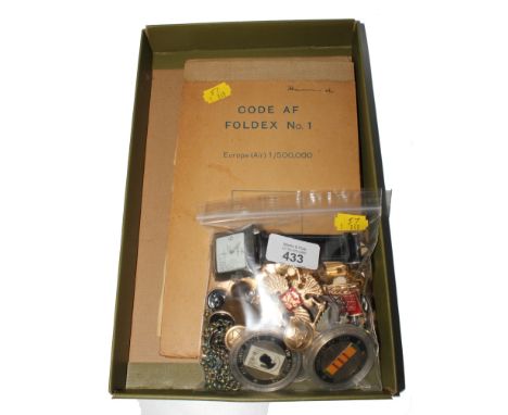 A bag of badges, cufflinks, maps, etc £20-40