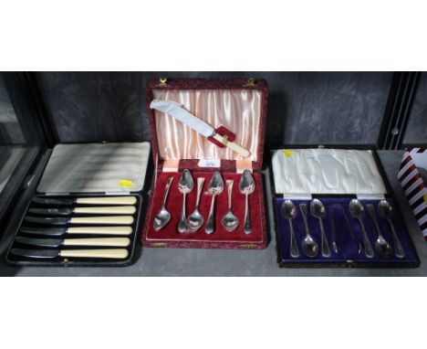 An assortment of silver plated cased flatware, to include six grapefruit spoons, six scone knives, six tea spoons and sugar t