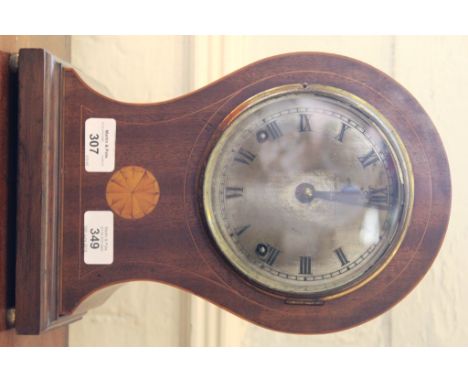 A James Walker of London mahogany-cased Edwardian mantle clock with string inlay and circular shell marquetry motif, circular