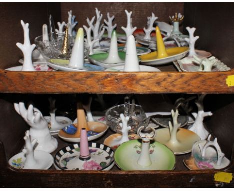 An interesting assortment of ceramic and glass ring holders, (approx 60) £50-80